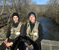 Sitting on bridge, fly fishing below