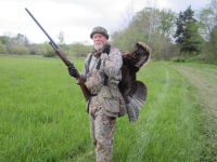 Jeff with gun and turkey